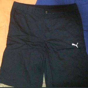 Black golf shorts